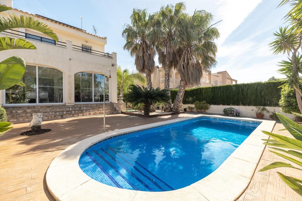 Property building, Living room, Swimming pool
