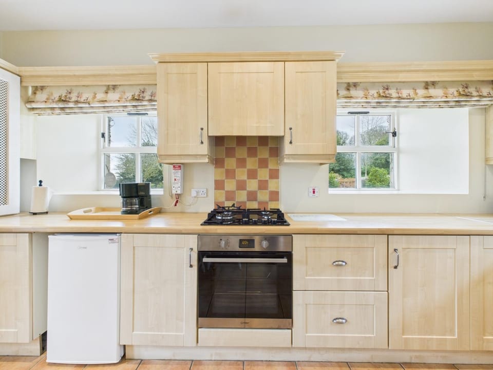 Kitchen or kitchenette, oven, stove