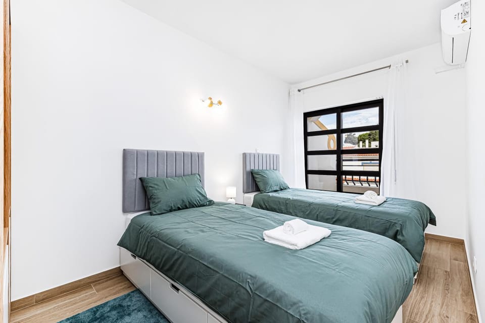 Bed, Photo of the whole room, Bedroom, towels, air conditioner