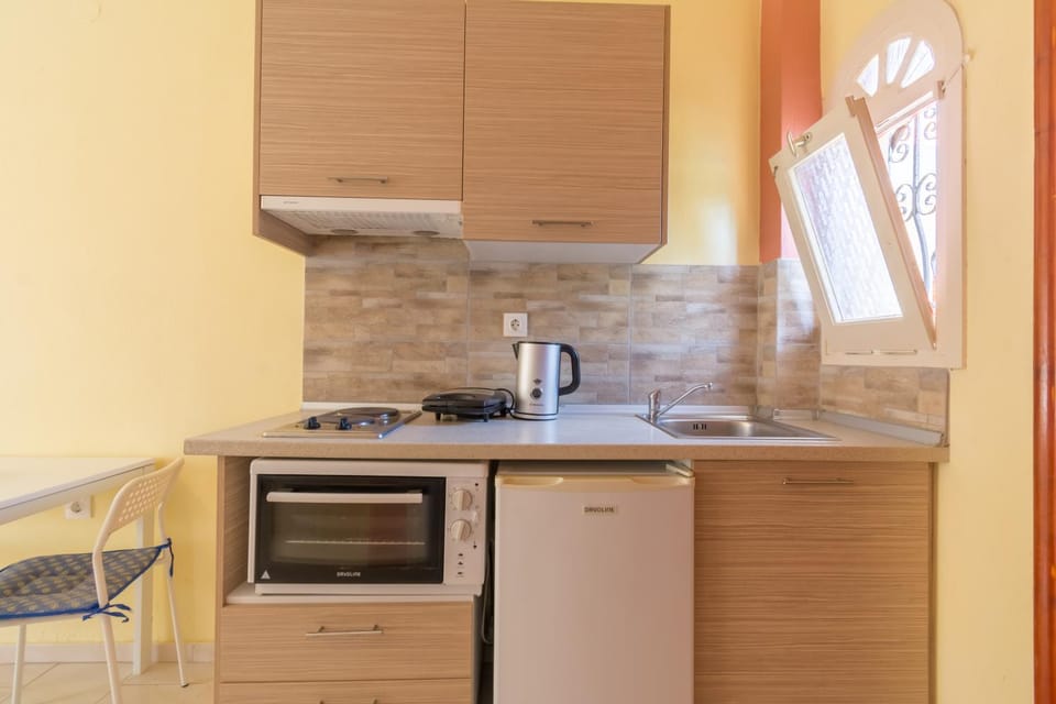 Kitchen or kitchenette, oven, stove, toaster