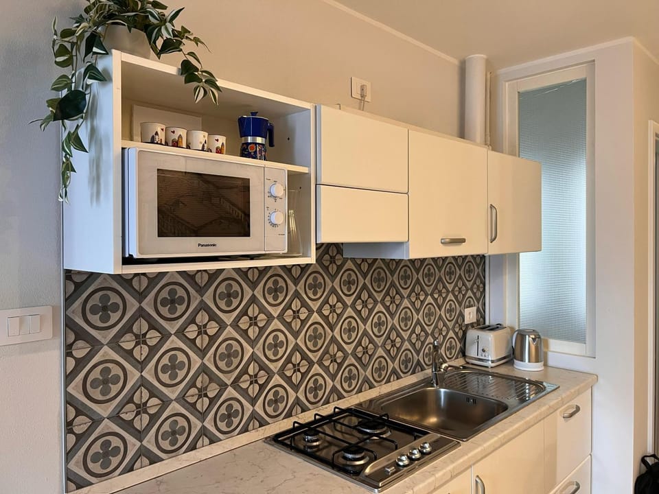 Kitchen or kitchenette, stove