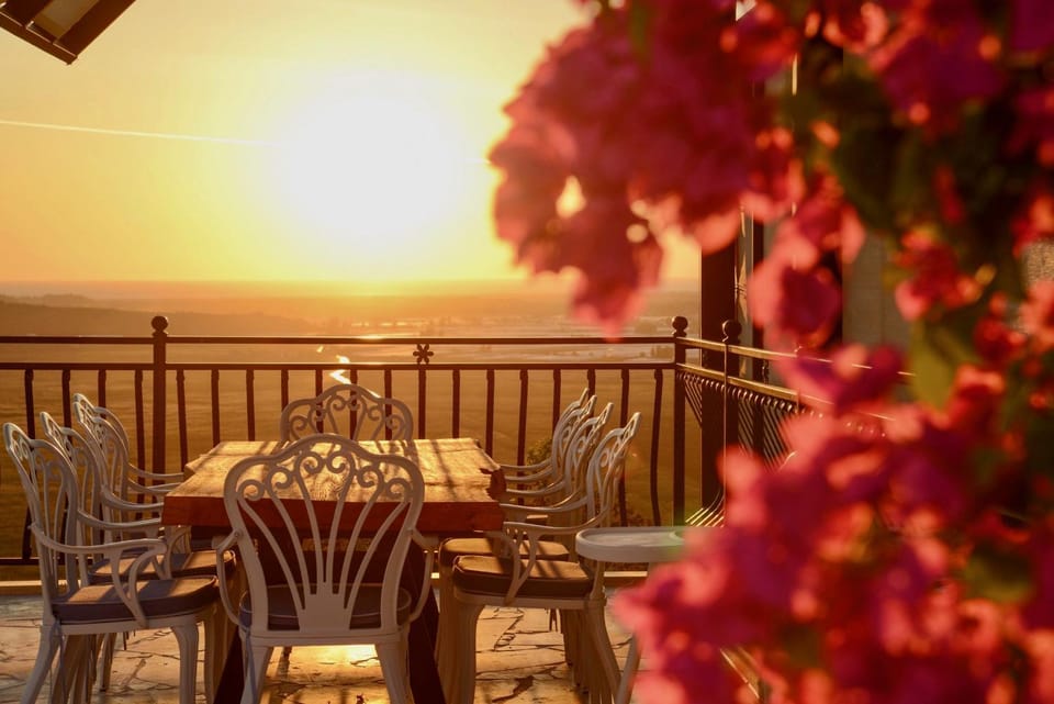 View (from property/room), Balcony/Terrace, Dining area, Sunset