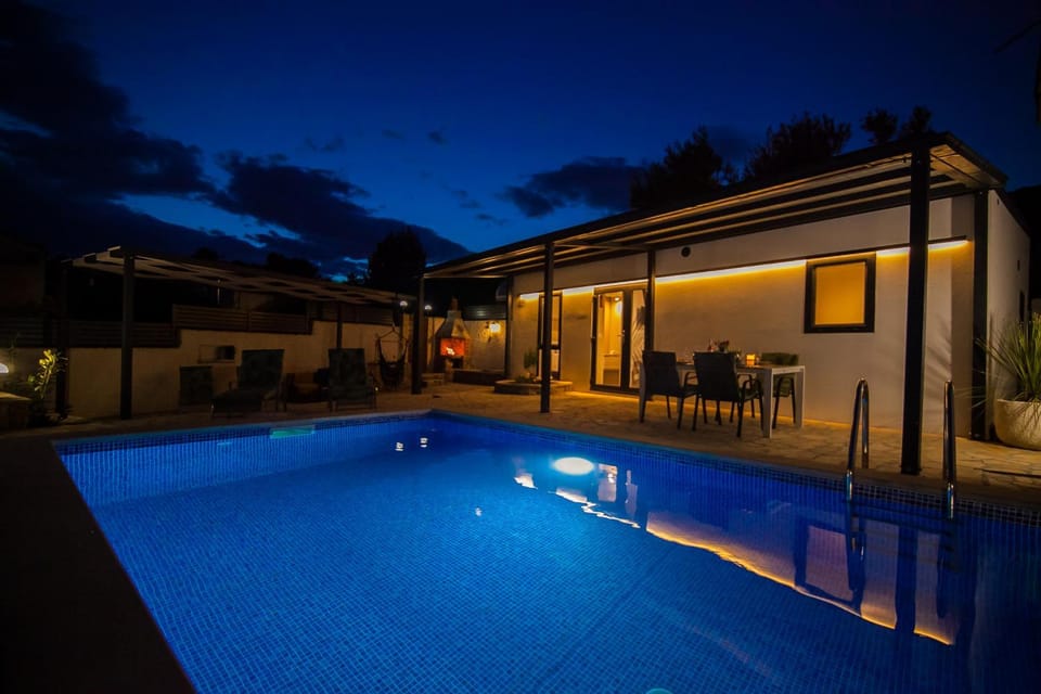 Property building, Night, Swimming pool