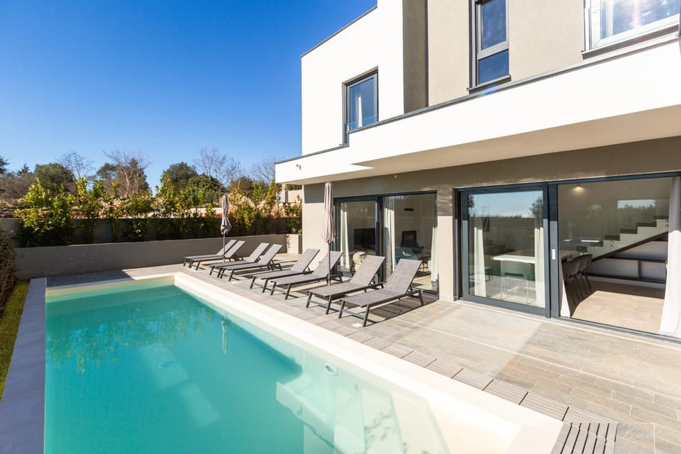 Property building, Day, View (from property/room), Pool view, Swimming pool, sunbed