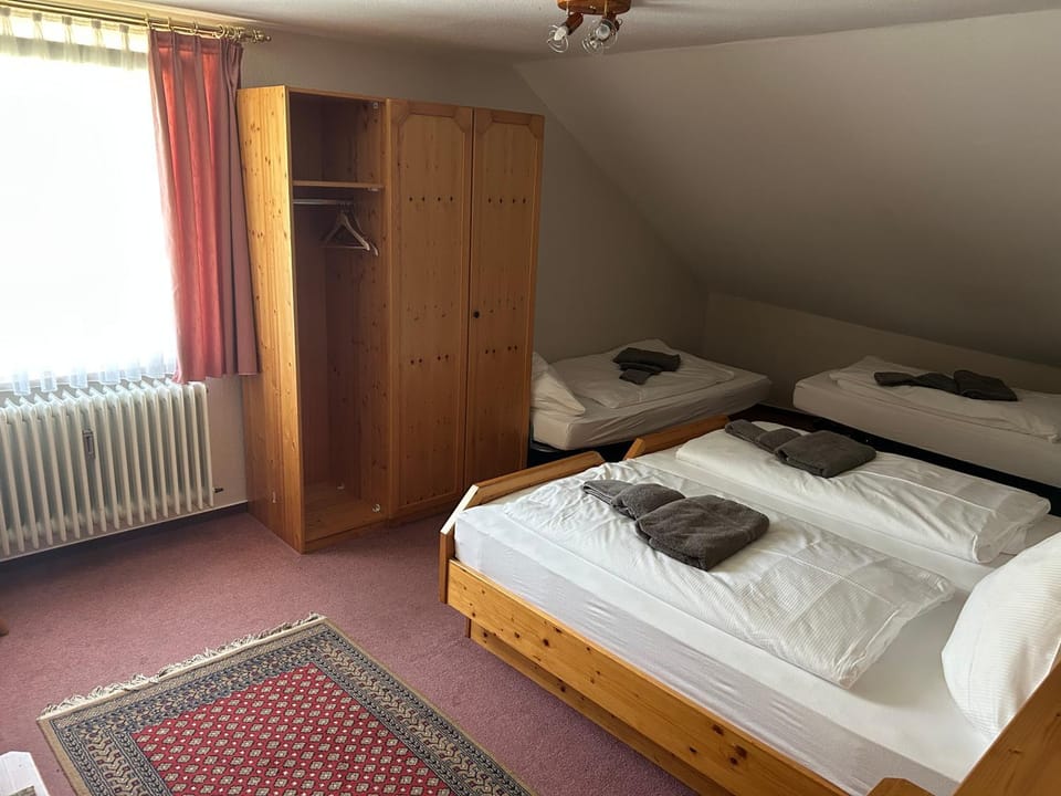 Bed, Photo of the whole room, towels, wardrobe