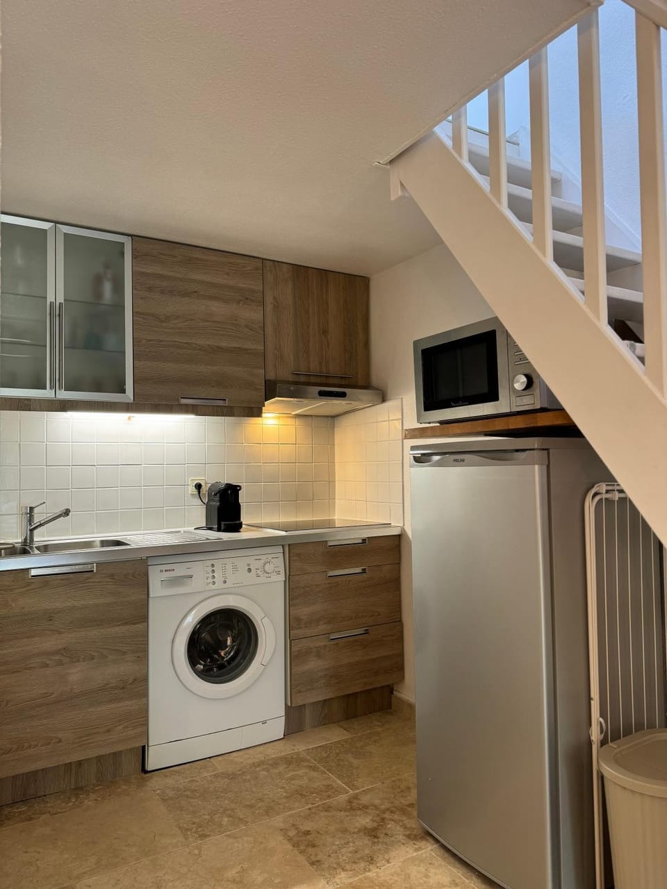 Kitchen or kitchenette, oven, stove, washing machine