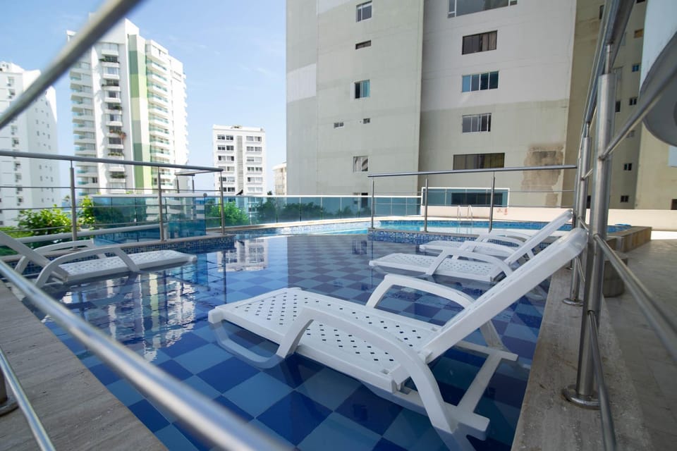 Swimming pool, sunbed