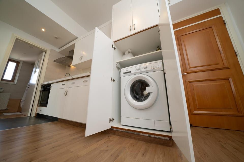 Kitchen or kitchenette, washing machine