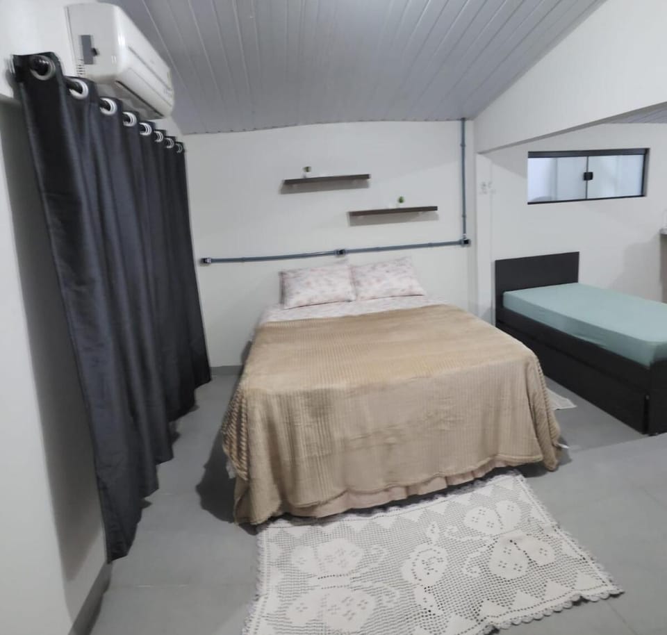 Bed, towels, air conditioner