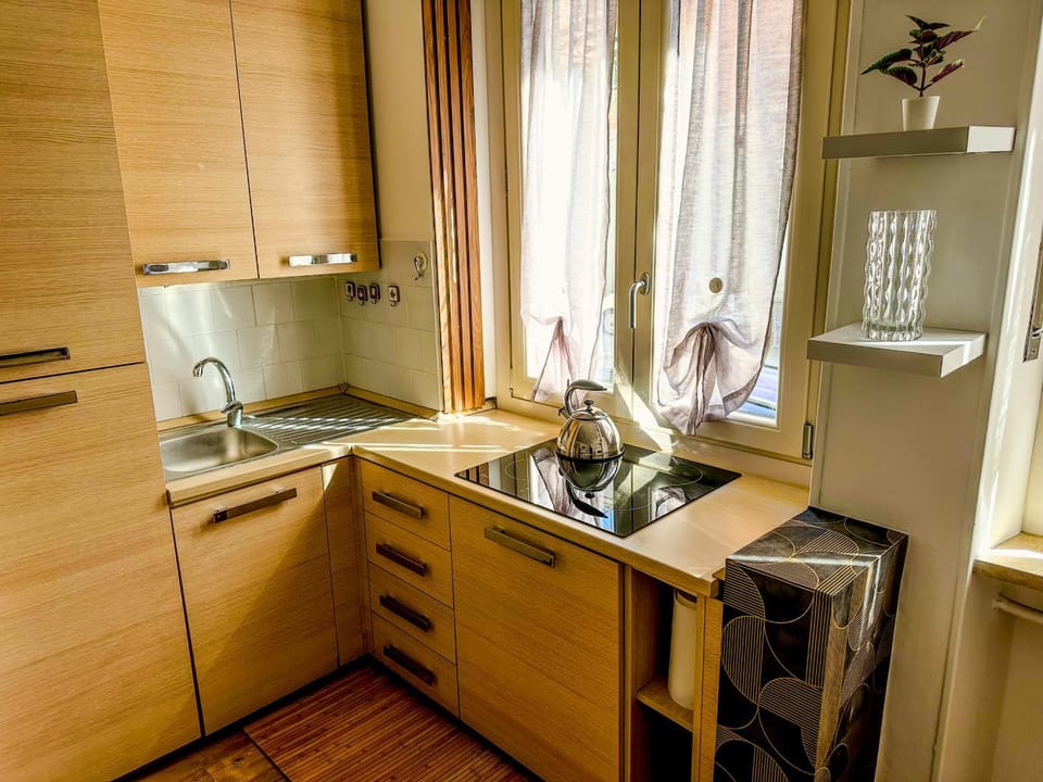 Kitchen or kitchenette, stove