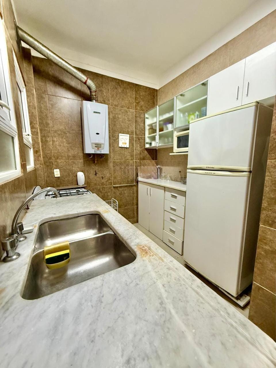 Kitchen or kitchenette, oven, stove