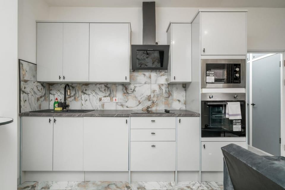Kitchen or kitchenette, oven, stove