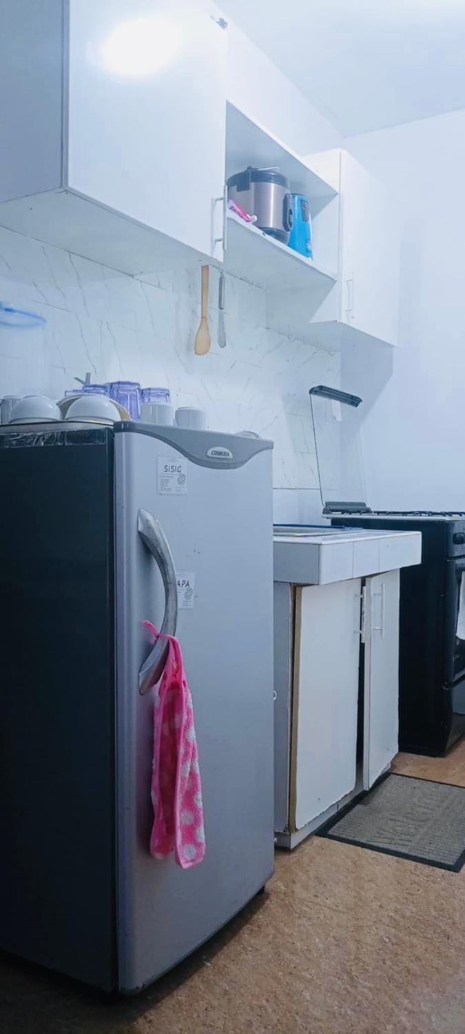 Kitchen or kitchenette, oven, stove