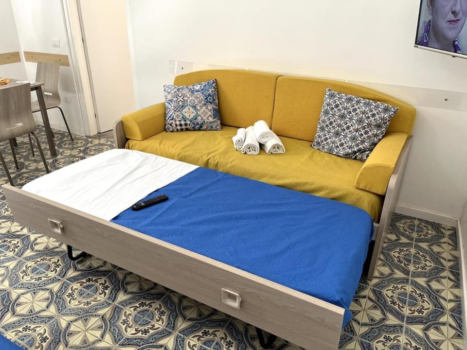 Bed, Seating area, Bedroom