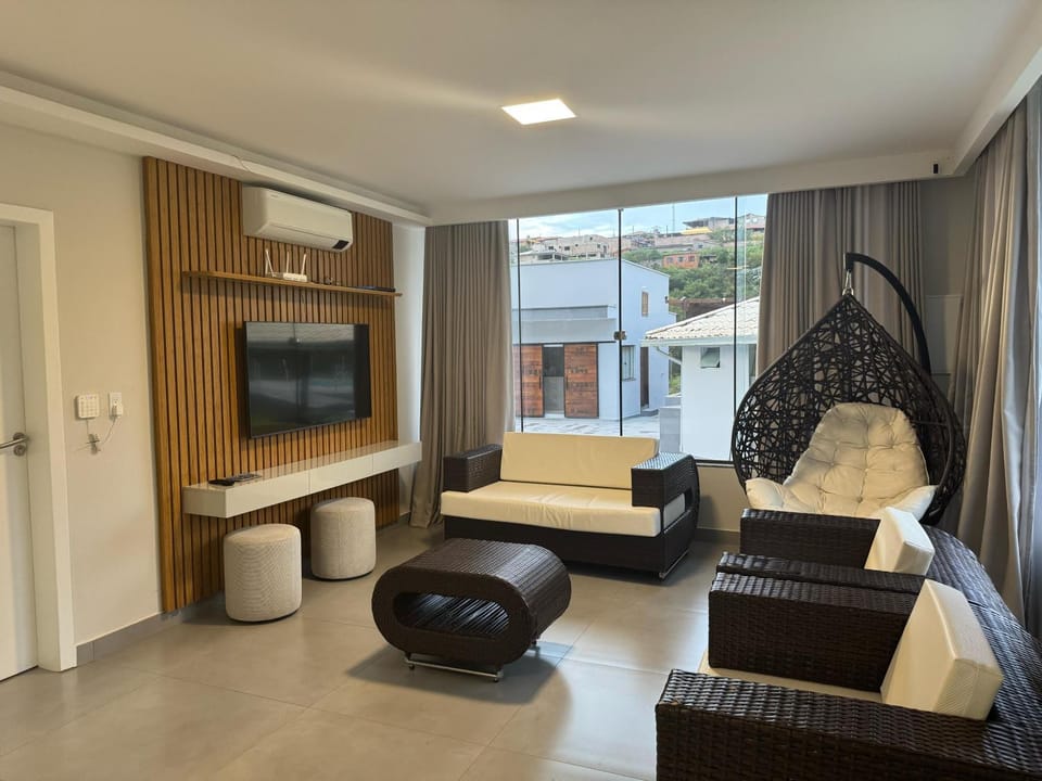 Communal lounge/ TV room, TV and multimedia, View (from property/room), Living room, Spa and wellness centre/facilities, Decorative detail, Seating area, Evening entertainment, Garden view, air conditioner