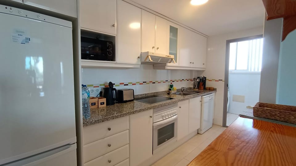 Kitchen or kitchenette, stove, toaster