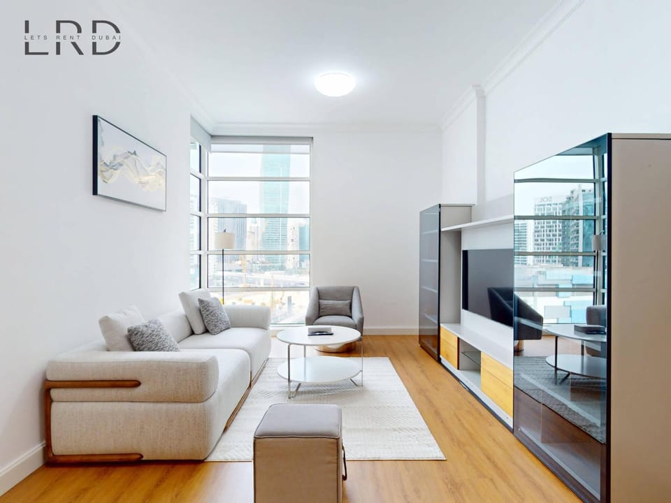 Charming 1BR Apartment with Canal View in Business Bay Apartment in Dubai