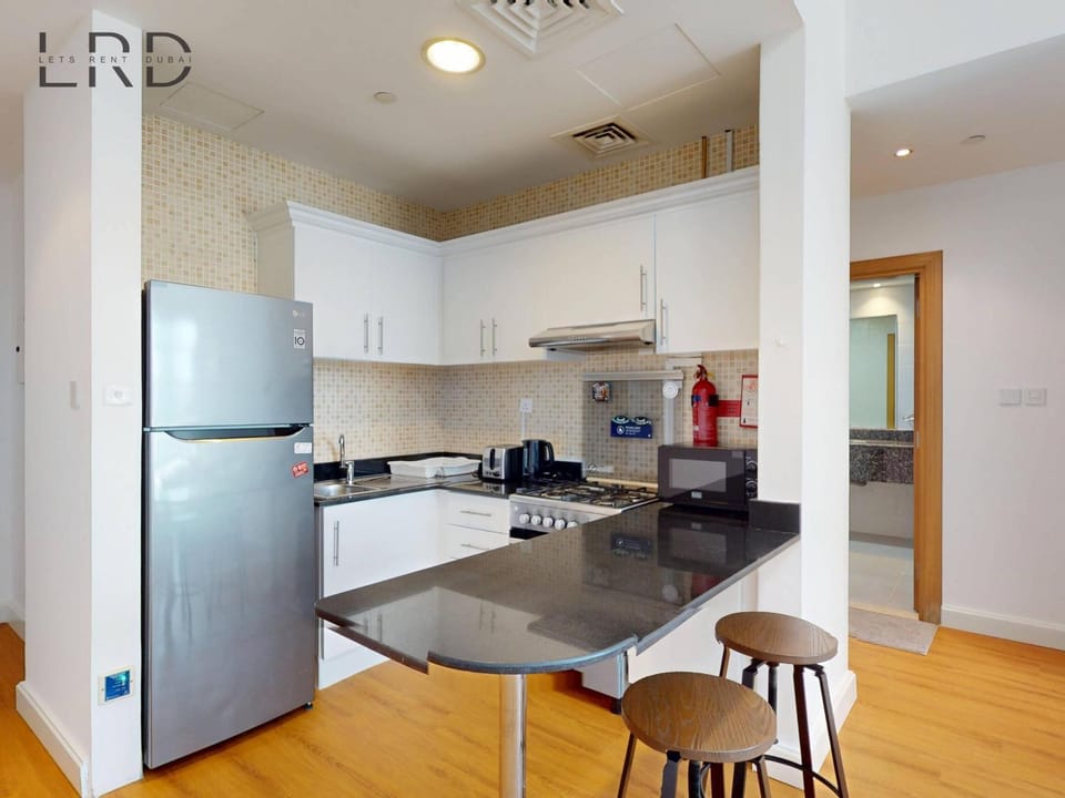 Charming 1BR Apartment with Canal View in Business Bay Apartment in Dubai