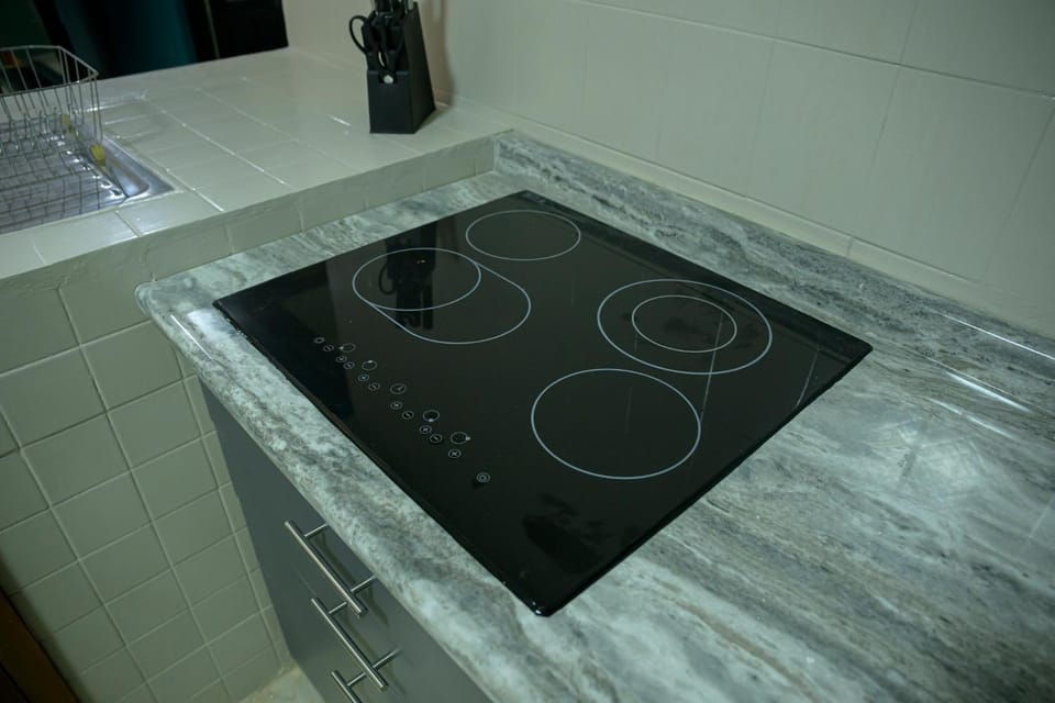 Kitchen or kitchenette, stove