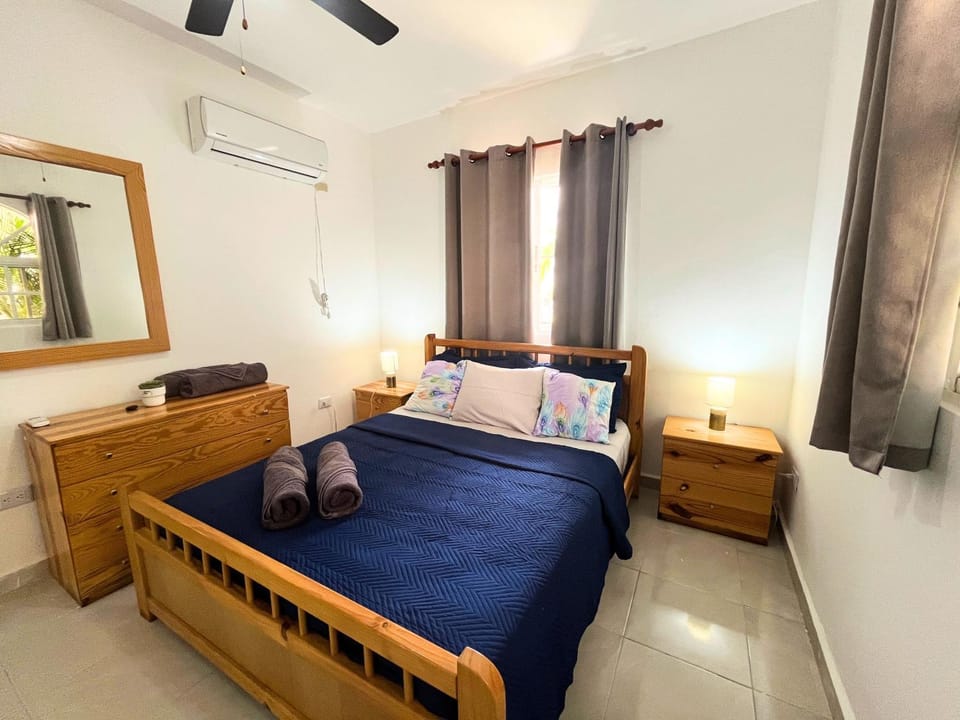 Photo of the whole room, Bedroom, towels, air conditioner
