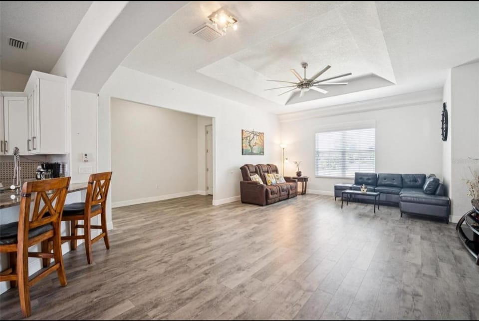 Newer Construction Home in Port Richey 3BR 2BA Bright with High Ceilings, Screened Lanai & Lake View, Fully Furnished, Conveniently Located on a Corner Lot with No Front Neighbors, Short Walk to US-19, Shops & Restaurants House in Bayonet Point