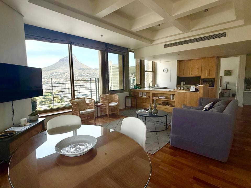 TV and multimedia, Kitchen or kitchenette, Living room, Seating area, Mountain view, air conditioner