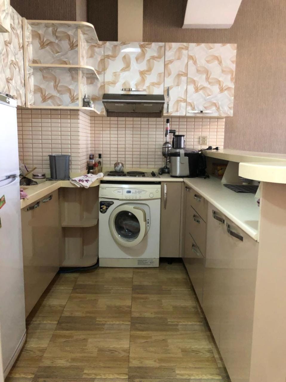 Kitchen or kitchenette, oven, stove, washing machine, dryer
