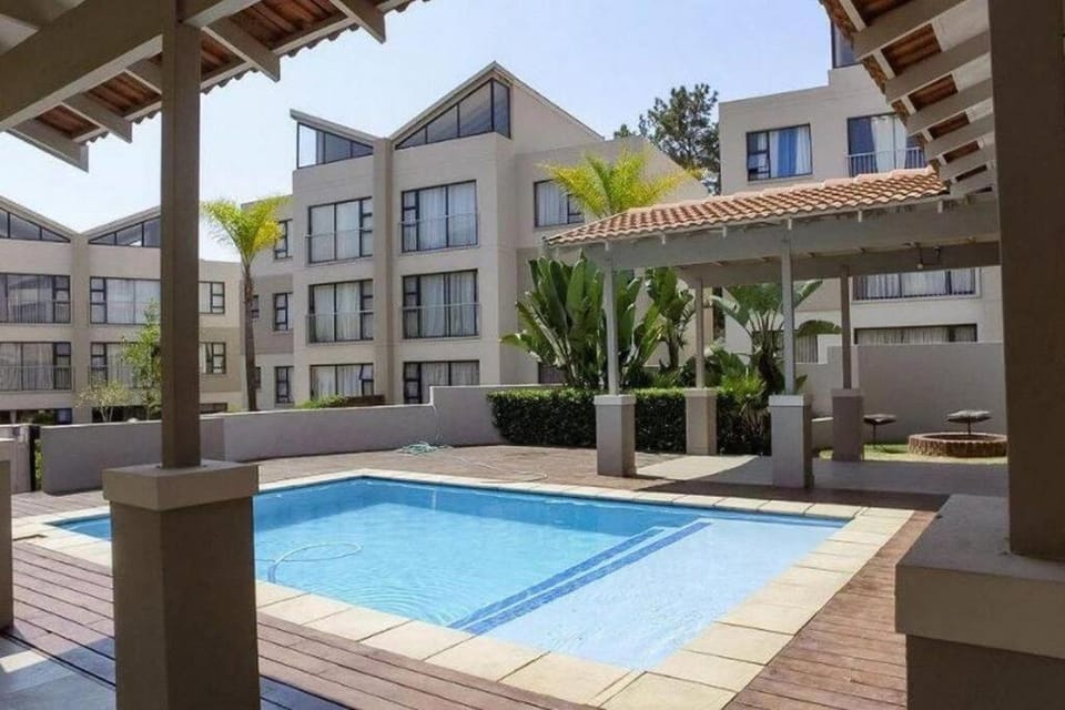 Property building, Day, Pool view, Swimming pool