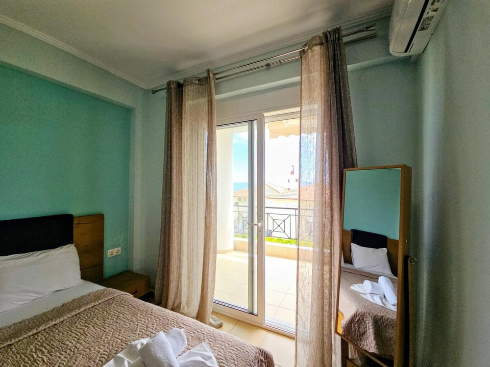 Bed, Photo of the whole room, Bedroom, towels, air conditioner