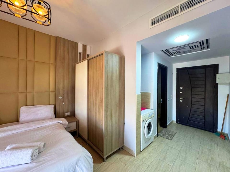 Bed, wardrobe, air conditioner