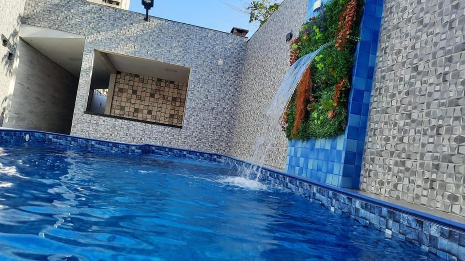 Casa aconchegante com piscina a 50 metros da praia House in State of São Paulo