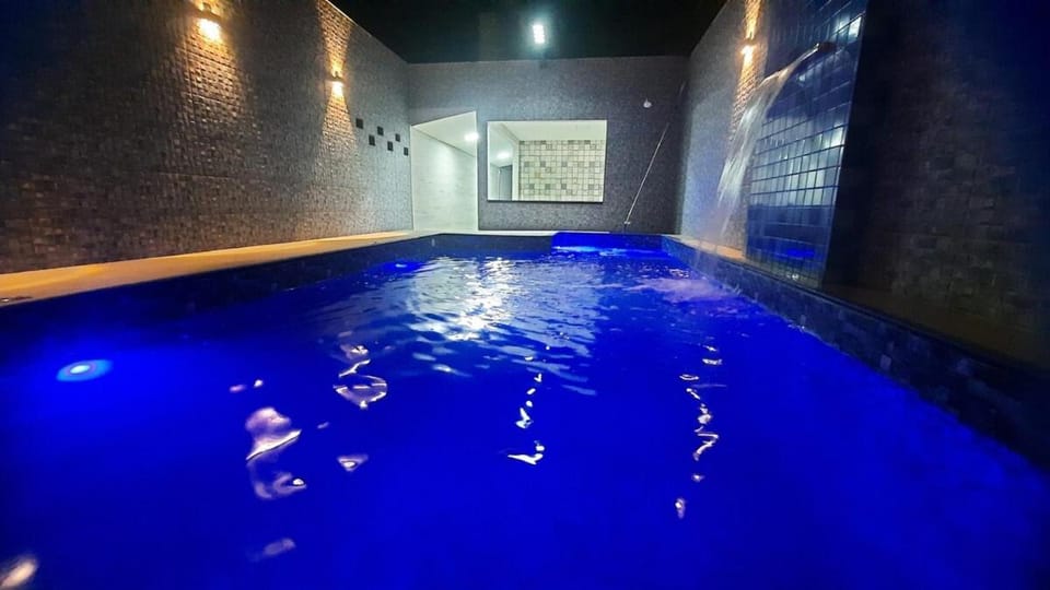 Casa aconchegante com piscina a 50 metros da praia House in State of São Paulo