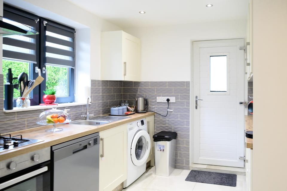 Kitchen or kitchenette, dishwasher, oven, stove, washing machine, kitchen