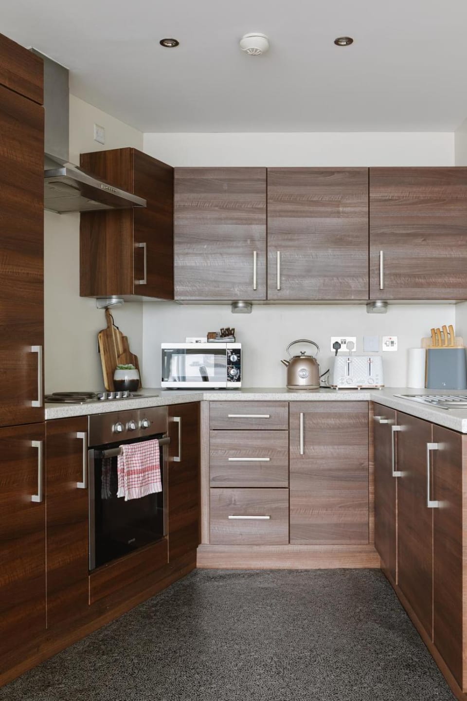 Kitchen or kitchenette, stove, toaster