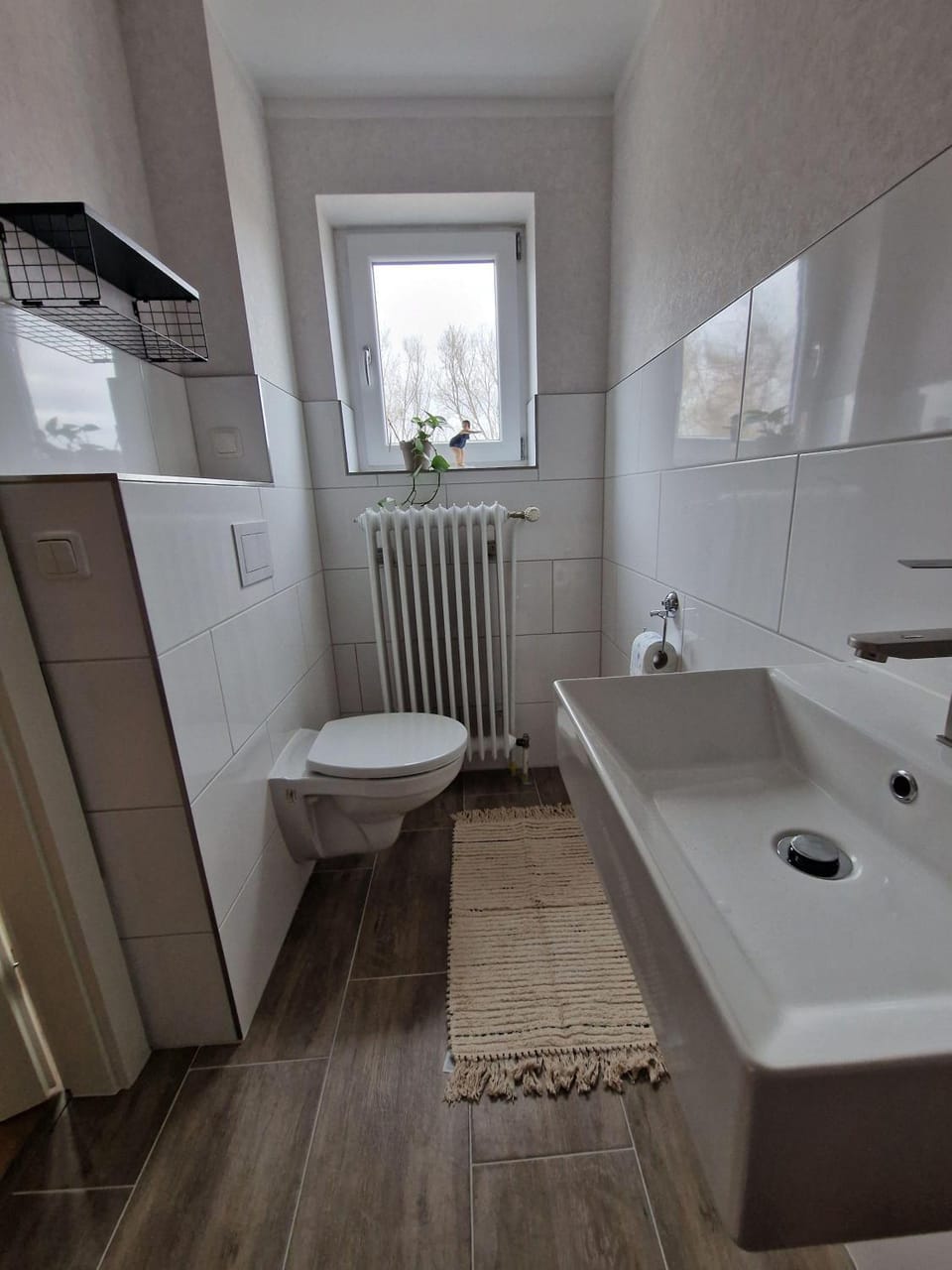 Haus-Fehmarn-am-Dorfteich-|-Wohnung-2-West Apartment in Ostholstein