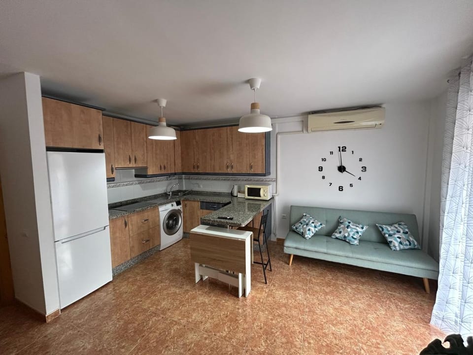 Kitchen or kitchenette, Living room, Dining area, stove, washing machine, air conditioner