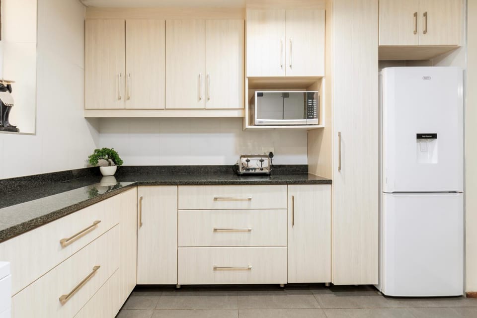 Kitchen or kitchenette, toaster