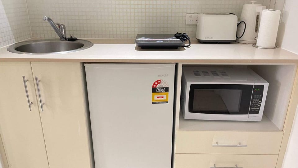 Kitchen or kitchenette, stove, toaster
