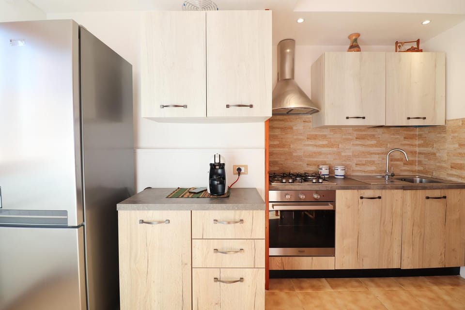 Kitchen or kitchenette, oven, stove