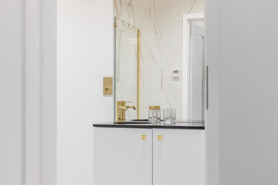 Shower, Bathroom, flat iron, hair dryier, towels