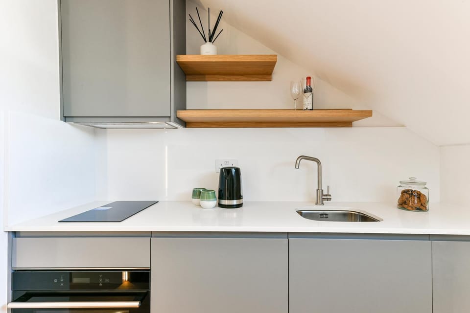Kitchen or kitchenette, microwave, oven, stove