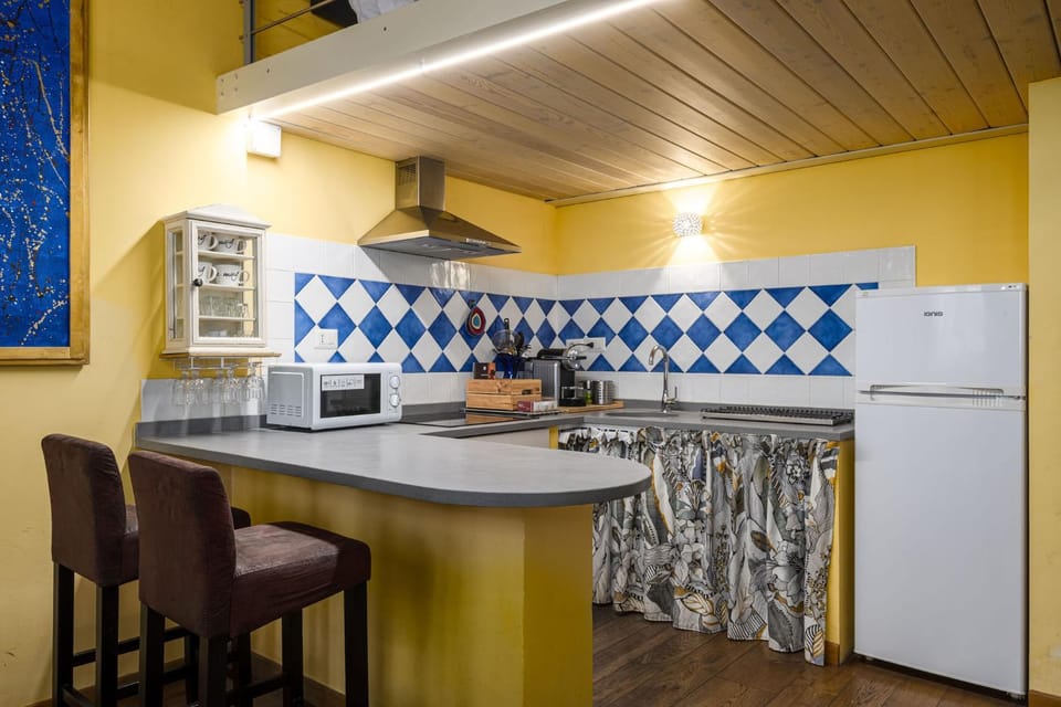 Kitchen or kitchenette, oven, stove