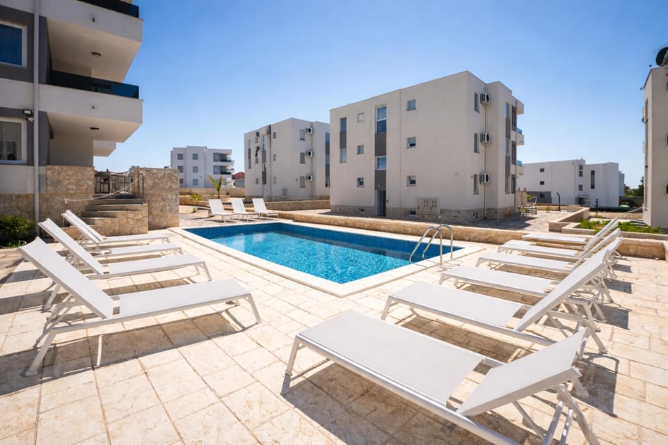 Swimming pool, sunbed