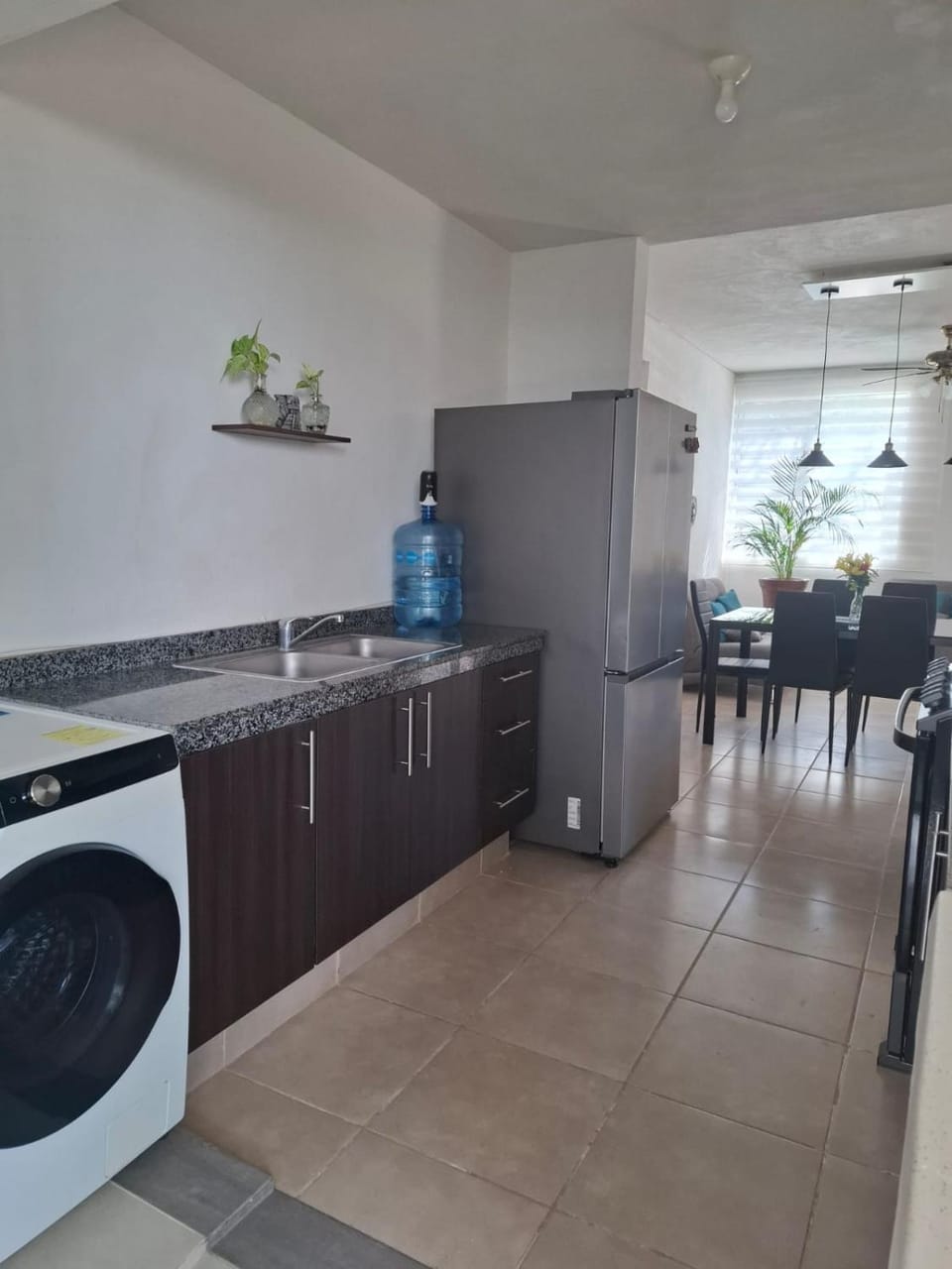 Kitchen or kitchenette, washing machine
