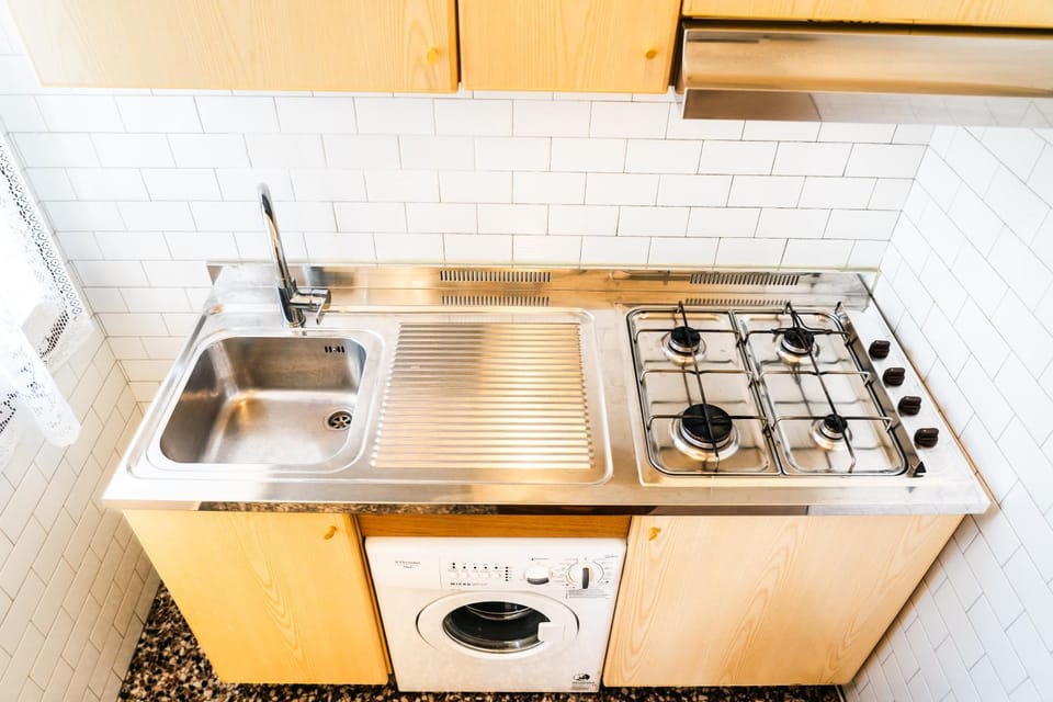 Kitchen or kitchenette, stove