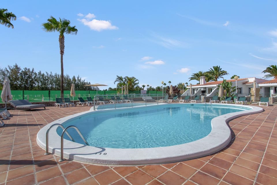 Property building, Living room, Swimming pool