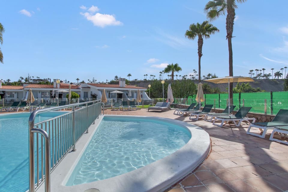 Property building, Living room, Swimming pool