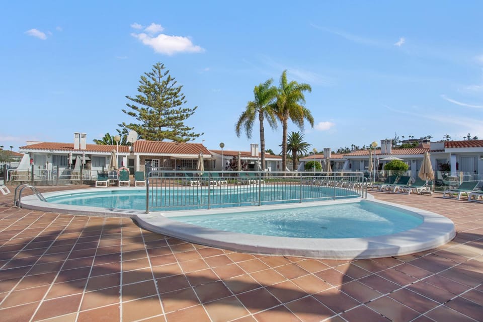 Property building, Living room, Swimming pool