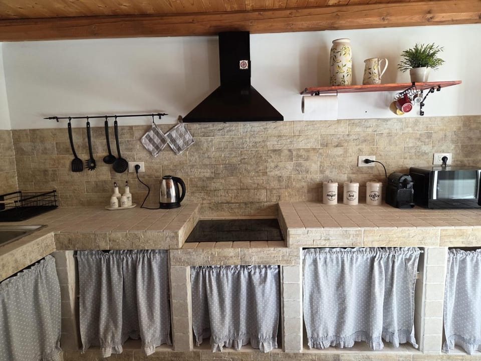 Kitchen or kitchenette, stove, kitchen