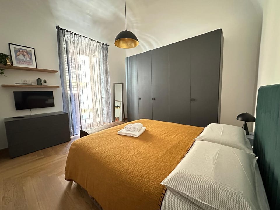 Bed, TV and multimedia, Bedroom, towels, wardrobe